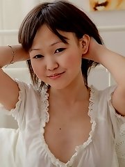 Asian nude teenager strokes muff