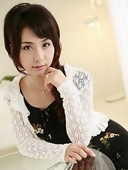 Office lady Tomoe Hinatsu is posing