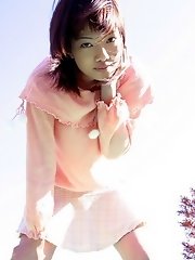 Naughty tramp in pink quickly flashes pussy