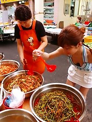 Japanese slut shopping for sausage at market
