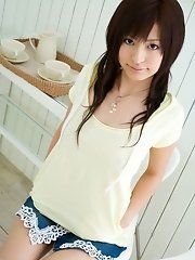 Cute Asian teen showing off her nice tits