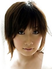 Big titted Asian model is a hottie