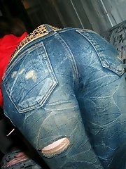 Jeans wearing Asian tramp has a tempting ass