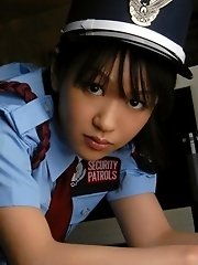 Naughty Asian cop takes off her shirt