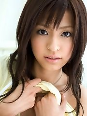 Cute Asian teen showing off her nice tits