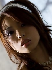 Lovely teen Risa has a sexy ass she shows off