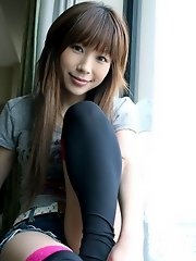 Adorable Asian teen in short shorts
