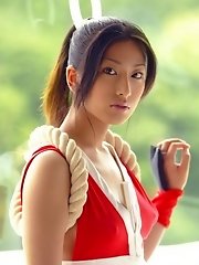 Asian slut in red enjoys showing her body off