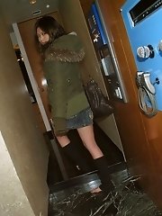 Naughty Miyo disrobes at home and exposes ass