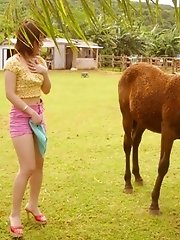Naughty slut lifts sarong for a look at pussy