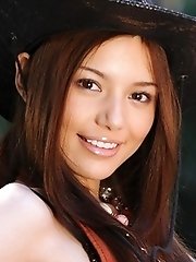 Asian slut slowly takes off clothes for show