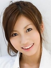 Asian teen opens her shirt