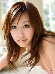 Sexy and horny Japanese av idol Natsuki Yoshinaga shows her slim naked body