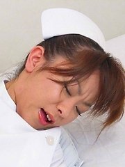 Japanese nurse Miina Minamoto alone and toying in a room