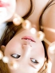 Sexy and horny Japanese av idol Miyu Sakurai shows her amazing naked body with twist