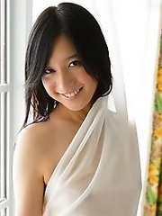 Cute and innocent Japanese av idol Iori Kogawa shows her amazing smile while being naked