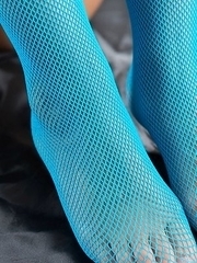 Long-haired hottie Shino Aoi shows her stocking-clad legs and gives an assjob