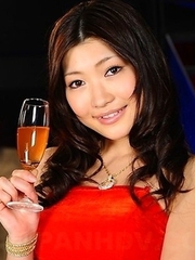 Karin Kusunoki poses in red dress