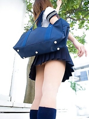 Runa Hamakawa plays with her uniform skirt after classes
