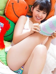 Rina Koike in socks and colorful bath suit is so playful