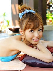 Aino Kishi in blue bath suit is a true beauty enjoying sand