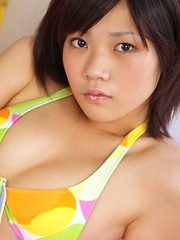 Airi Sakuragi shows racy bum and round cans in bath suit