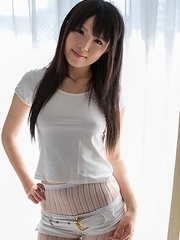 Hottie in white Sena Sakura shows off her perfect body on a big white bed