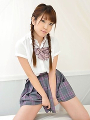 Mizuho Shiraishi with pigtails and uniform sits with ass up