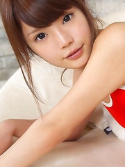 Manami Sato with sexy curves in bath suit plays with pillow