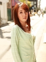 Chika Sasaki in green sweater and short skirt