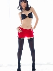 Natsuki Yokoyama takes off her red and black get-up before working on that cock